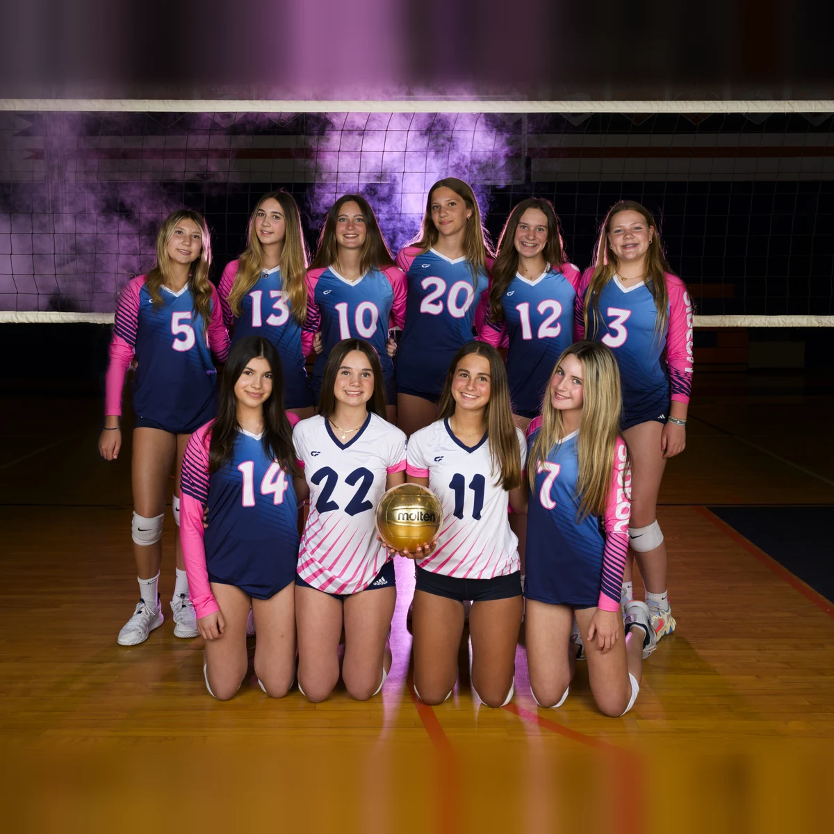 Club volleyball team in custom Sideout uniforms